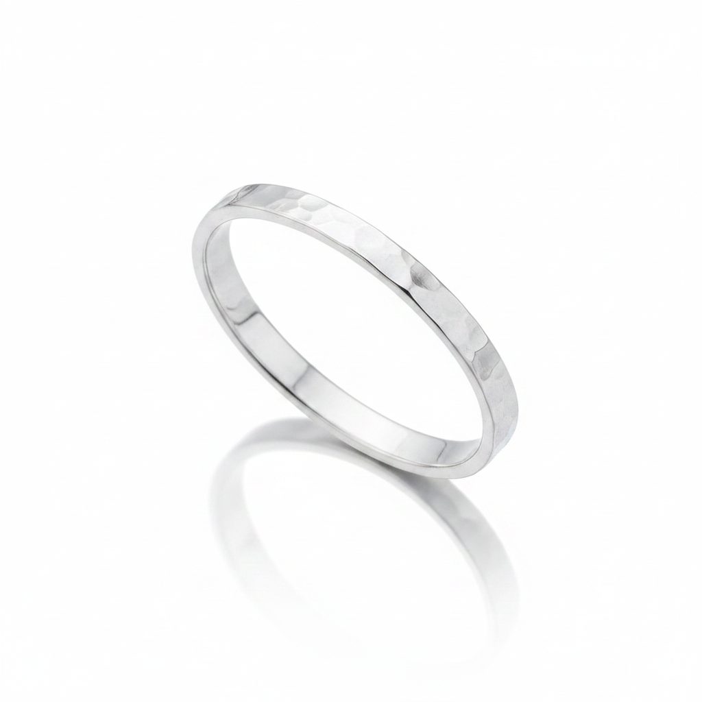 Thin Hammered Faceted Flat Band Silver Ring Pure White Background Tilted Reflection 1x1