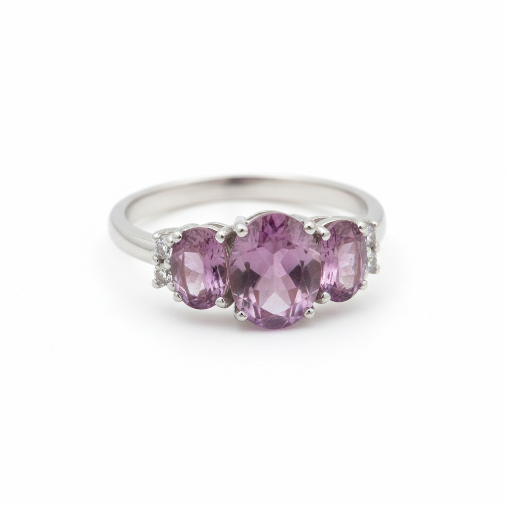 Three Stone Amethyst Silver Ring Angled White Background HD