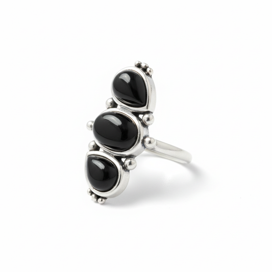 Three Stone Vertical Black Onyx Ring Angled White Background HD