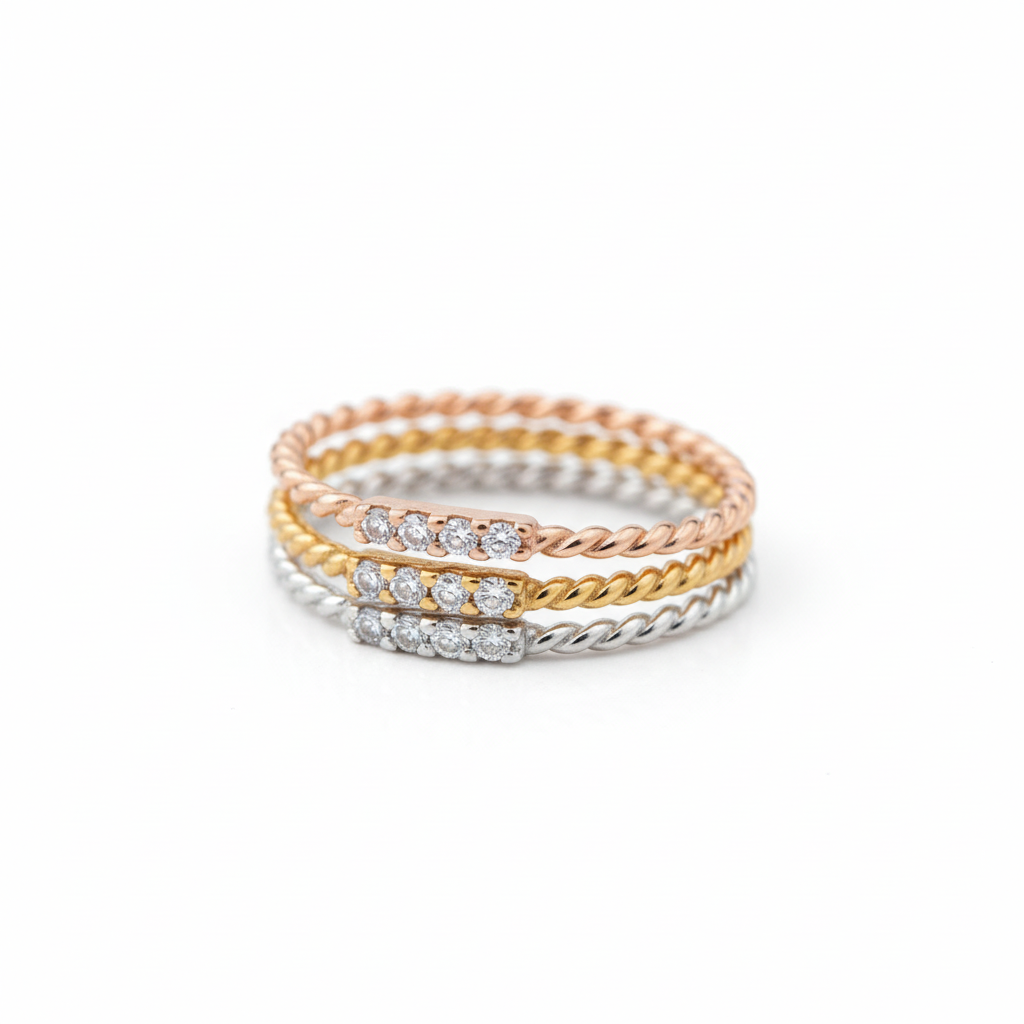 Three Tone Twisted Rope CZ Stacking Ring Set Angled White Background HD